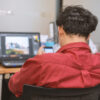 business man working in office with soft-focus and over light in the background