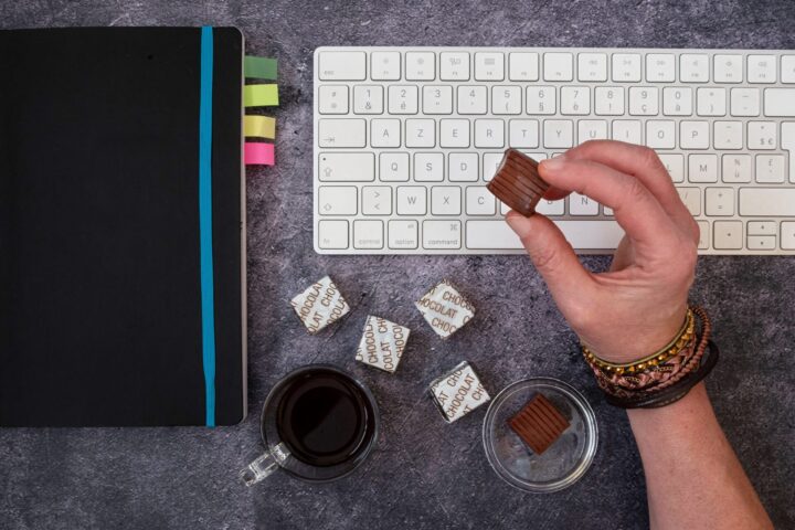 Office worker eating chocolate