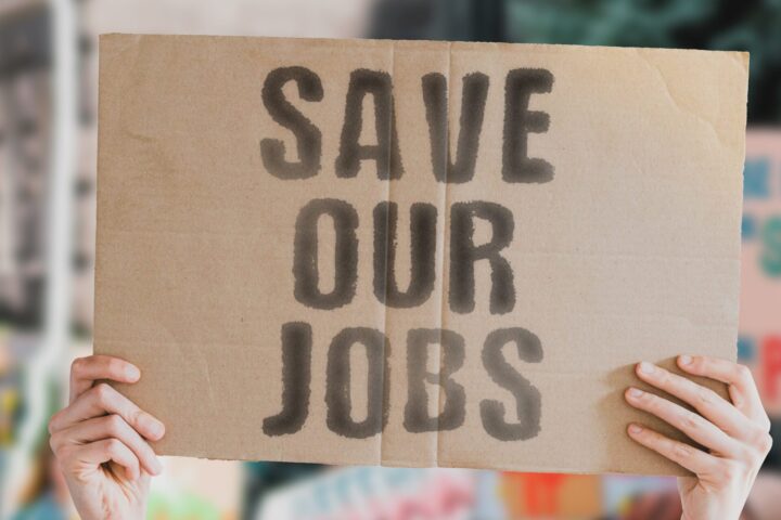 Save our jobs sign at protest