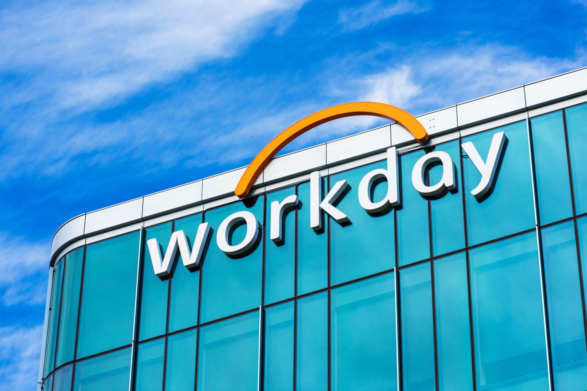 Workday headquarters building facade under beautiful sky. Workday, Inc. is on demand financial management and human capital management software vendor - Pleasanton, California, USA - 2022
