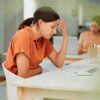 Lady with endometriosis and digestion illness at work