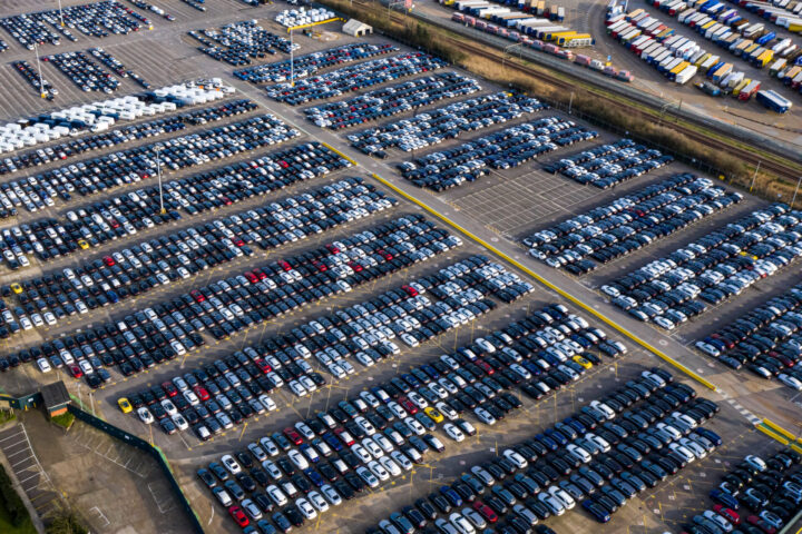 Aerial view car ship, New Cars produced up in the port for ship and import-export united kingdom