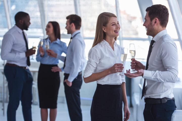 Workers drinking at work event