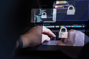 Cyber security, Business, technology, internet and networking, software development, digital data protection concept. Hacker hacking data on laptop computer with pop up antivirus system