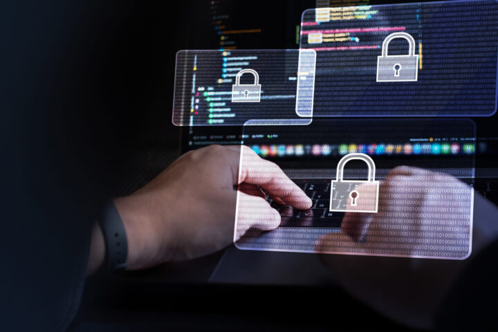 Cyber security, Business, technology, internet and networking, software development, digital data protection concept. Hacker hacking data on laptop computer with pop up antivirus system